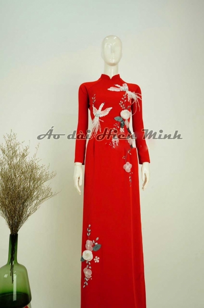 Áo dài cô dâu màu đỏ họa tiết uyên ương